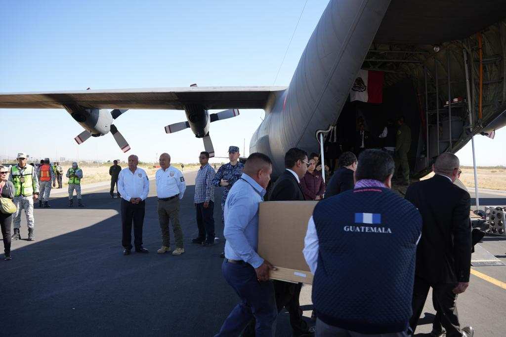 Repatrian cuerpos de 23 migrantes fallecidos en incendio en el INM